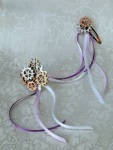 Pair of gear cluster hair clips connected by ribbons